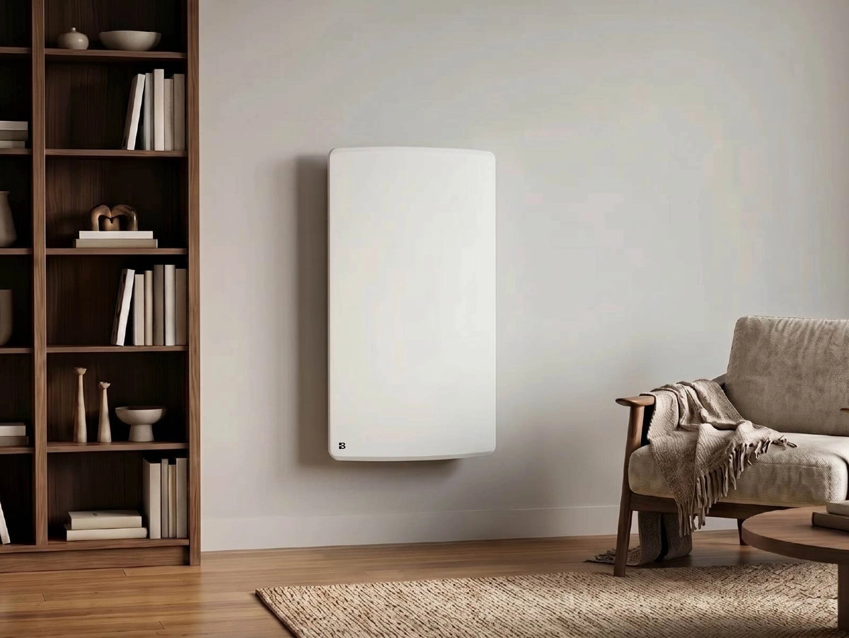Radiador de inercia seca cerámico ARIA VERTICAL en un salón acogedor