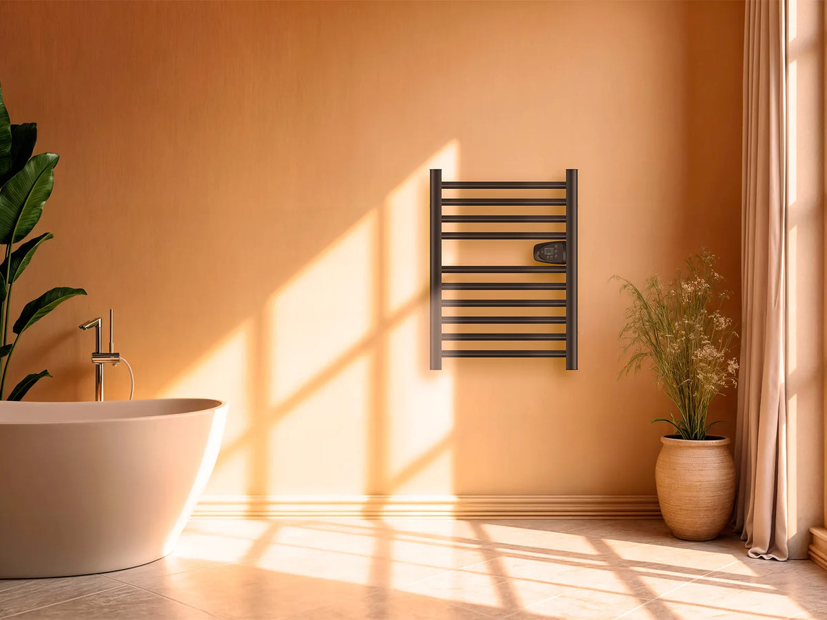 HESTIA BLACK dry-inertia heated towel rail in a staged bathroom