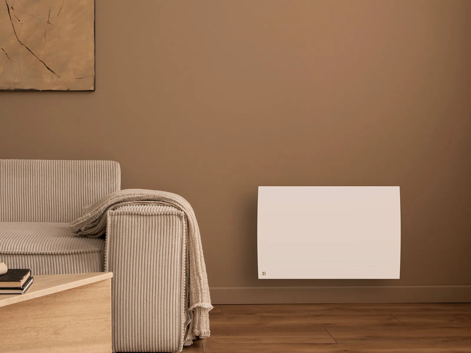 Radiateur à inertie sèche céramique connecté LESSO CONNECT dans un salon d'ambiance