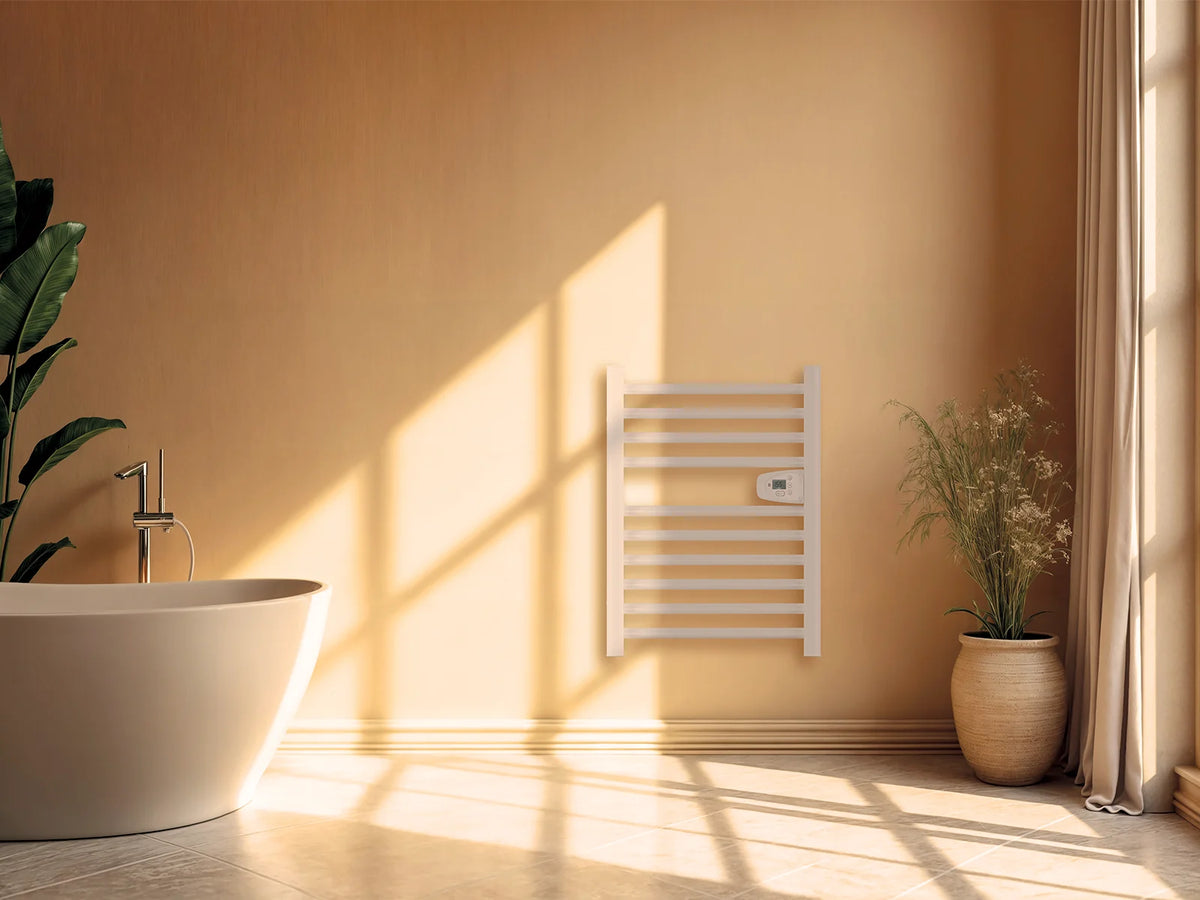 HESTIA WHITE dry-inertia heated towel rail in a staged bathroom
