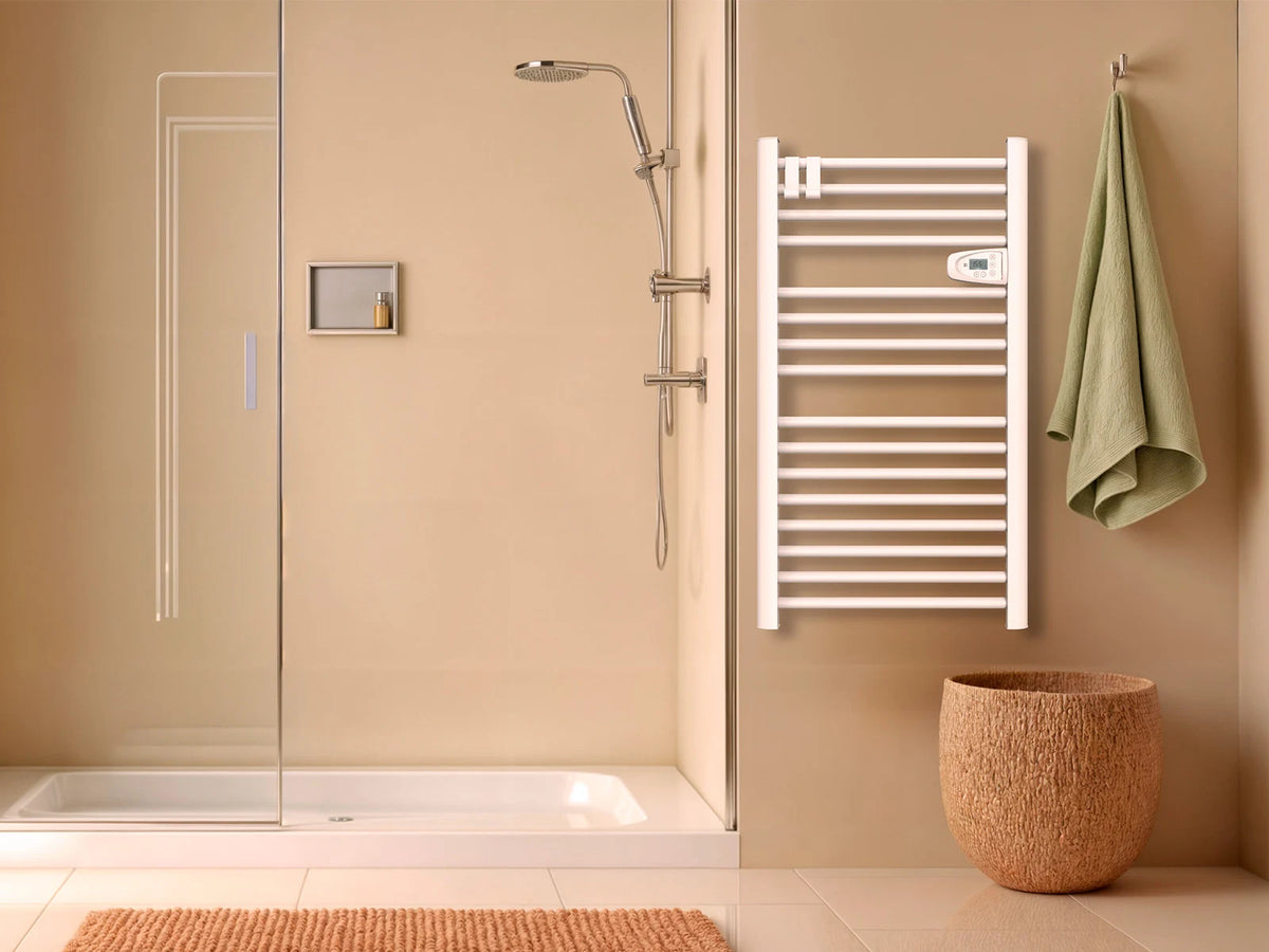 HESTIA WHITE dry-inertia heated towel rail in a staged bathroom
