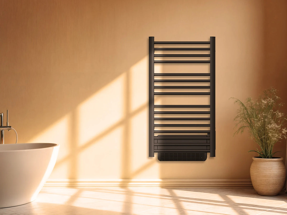 HESTIA BLACK dry-inertia heated towel rail in a staged bathroom