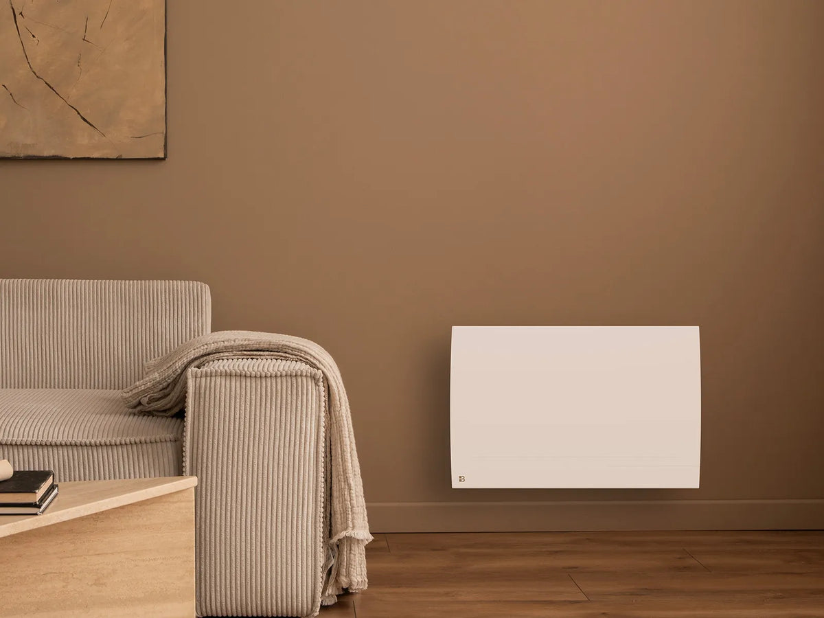 Radiateur à inertie sèche céramique connecté LESSO CONNECT dans un salon d'ambiance