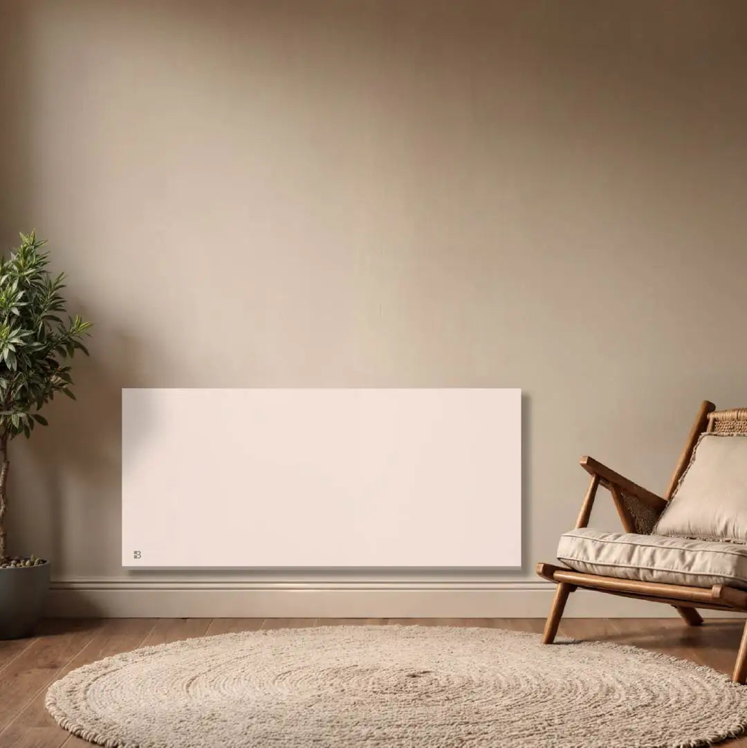 Radiateur électrique à inertie sèche céramique WiFi NESSA CONNECT Bestherm installé dans un salon moderne avec thermostat connecté programmable